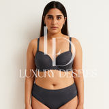black bra and panties set with 'Luxury Desires' branding.