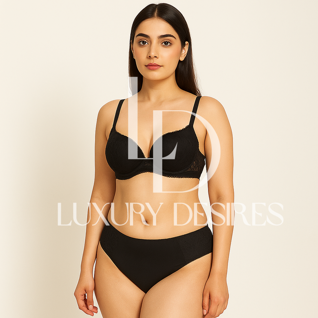 black bra and panties set with 'Luxury Desires' branding.