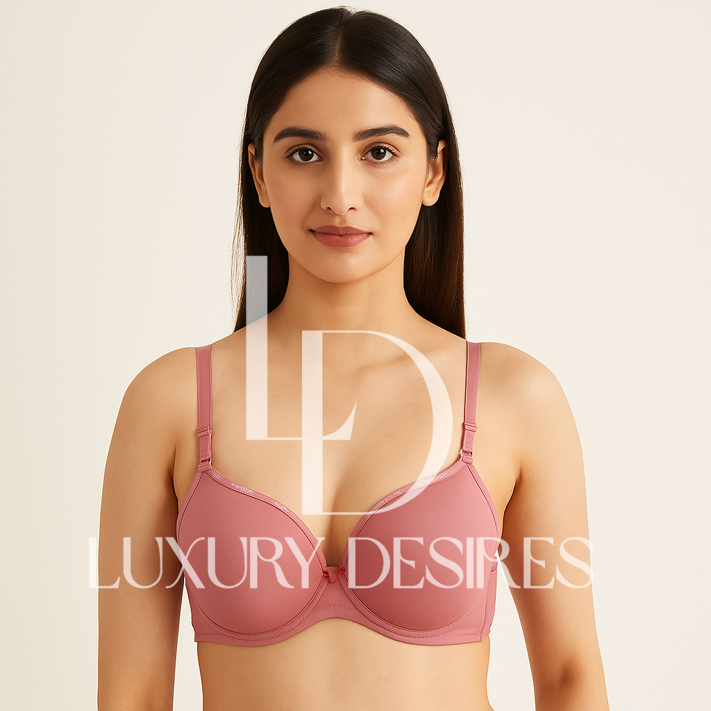 pink Padded bra with 'Luxury Desires' branding