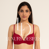 Red bra with 'Luxury Desires' branding